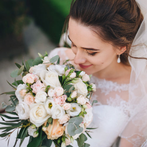 Bride holding flowers